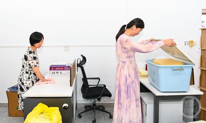 两江新区：清洗空调准备教材做好“功课”迎开学(图2)